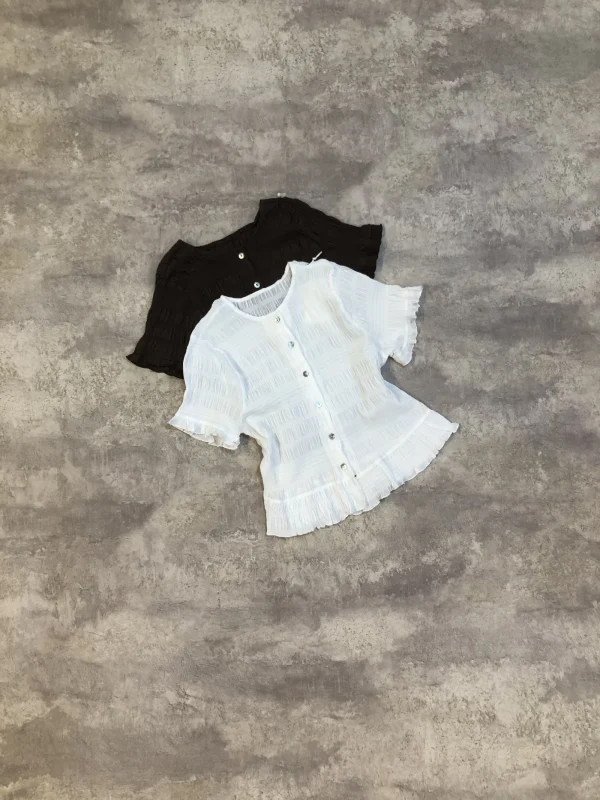 Blusa cloque botones